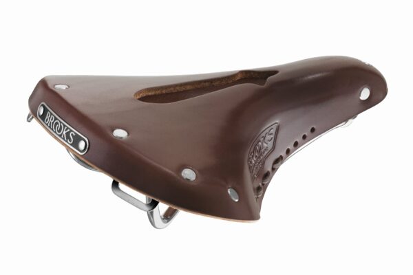 Brooks Mens Imperial Saddle Standard Size Handmade in England Chrome Frame Vegetable Tanned Leather Experience comfort and style with the Brooks Men's Imperial Saddle. Handmade in England using traditional techniques and premium materials, it features an imperial cut to relieve pressure. The chrome frame adds strength and elegance, while the vegetable-tanned leather ensures durability. Upgrade your ride with this classic piece.