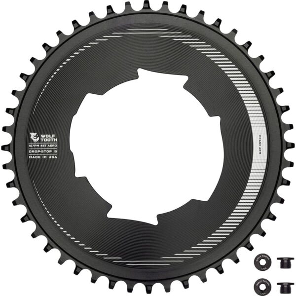 Components 107 Bcd Sram Aero Chainring Black 46T by Wolf Tooth Enhance your gravel and road racing experience with the Components 107 Bcd Sram Aero Chainring Black. Crafted from 7075-T6 aluminum, this chainring offers strength and lightweight performance. Available in sizes 46T to 50T, it is designed to optimize speed and integration with your crankset. The patented Drop-Stop design ensures durability, chain retention, and mud clearance, making it ideal for SRAM Eagle and Flattop chains.