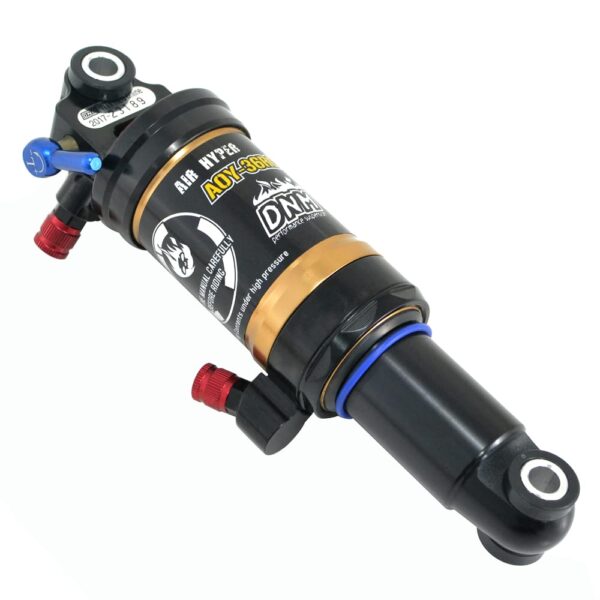 DNM AOY 36RC 165x35mm MTB Air Rear Shock with Lockout Gold ST1475N Upgrade your MTB experience with the DNM AOY-36RC Air Rear Shock. Weighing just 300g, this shock offers a 4-system damping with a 16-segment rebound adjustment knob. Enjoy a high-quality ride with dark hard-anodized AL-7075 shaft and a sleek black x gold finish.