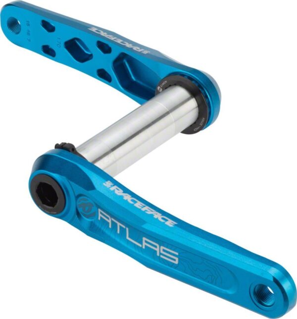 Race Face CK16AA170BLU Cranksets Blue 170mm United States Upgrade your ride with the Race Face Atlas Cinch Crank Arms. Versatile and durable, these crank arms offer a 12% increase in stiffness compared to the Turbine, ensuring a reliable performance on DH, trail, and enduro rides. Slimmer and lighter than previous versions, the Atlas Crank Arms feature a 3D forged back pocket design for enhanced strength without compromising on weight. With the latest Cinch system, switching between bikes is quick and easy, making it a versatile choice for all your biking adventures.