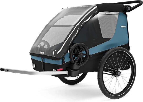 Thule Courier Dog Trailer Kit Padded Bed Adjustable Roof Cover Bike Stroll with Dog Spacious Cockpit Roll Up Mesh Window Rain Cover Enhance your outdoor adventures with the Thule Courier Dog Trailer Kit. This kit includes a padded dog bed and adjustable roof cover for comfort and protection. Bike or stroll with your furry companion in the spacious cockpit with large windows for visibility. Enjoy maximum airflow with the roll-up mesh window and stay prepared with the mesh and rain cover for extra protection.