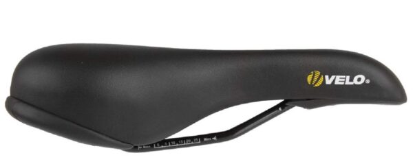 Velo Basic Edition Saddle Black 260 X 152 Mm Upgrade your cycling experience with the Velo Basic Edition Saddle in sleek black. Featuring a sporty look and ultra-light foam, this saddle offers comfort and style. The 'ARC-TECH' suspension, 'V-CUT' design, and 'O-Zone Base-Cut' provide additional support while the front, rear, and side protection ensure durability. Weighing only 343 g and measuring L = 265 x W = 150 mm, this saddle is a perfect blend of performance and design.